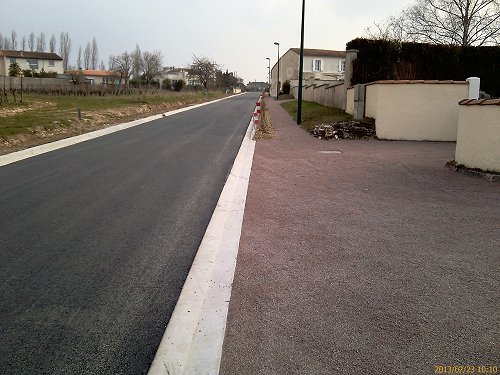 Goudronnage route du Sept-Un